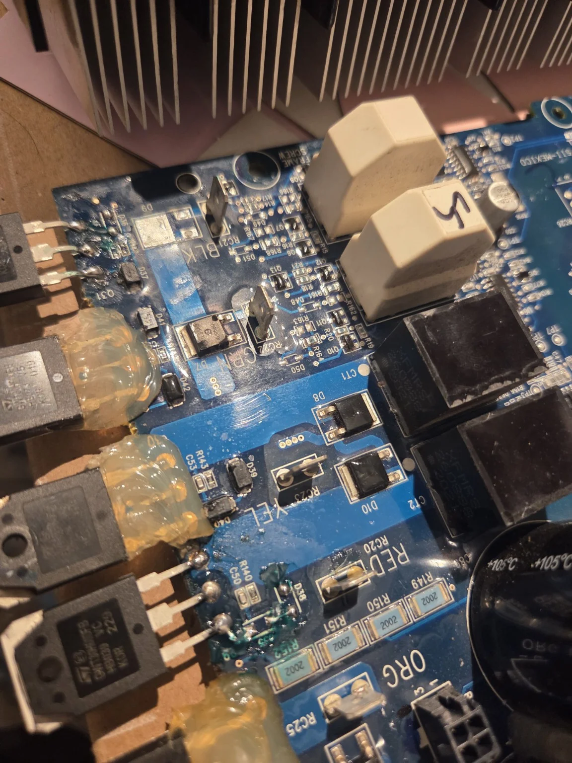 Close-up of power electronics and traces on the Nexaer repair bench